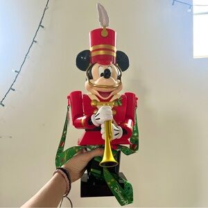 Disney Red Mickey Mouse Nutcracker Figurine with Gold Trumpet and Green Ribbon